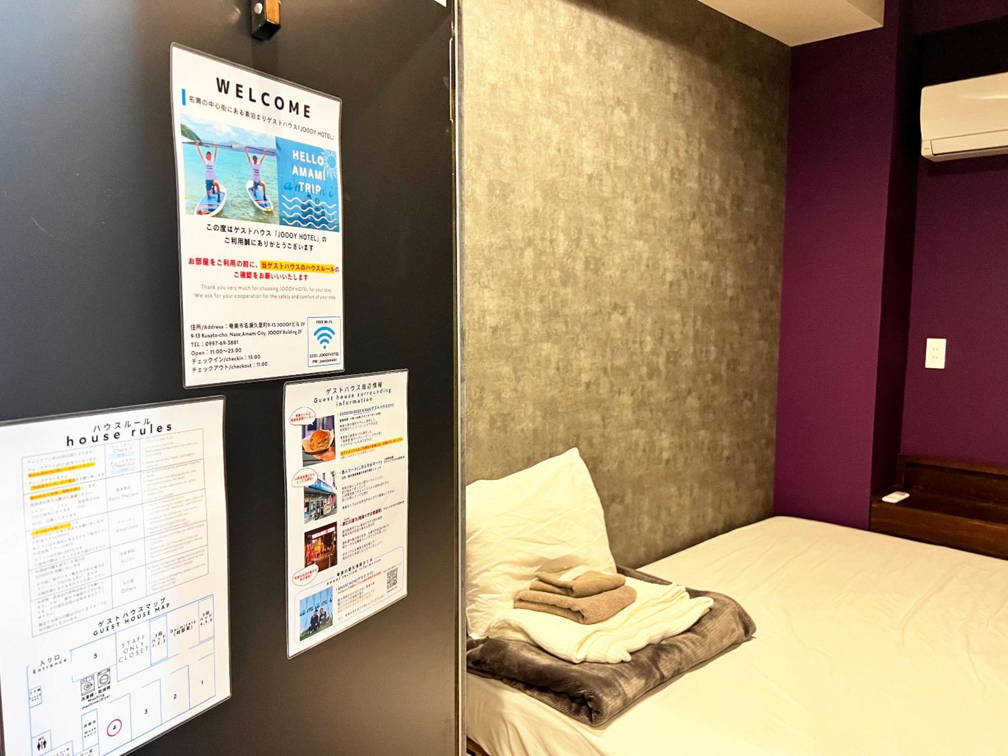 ゲストハウス Joooy Hotel 奄美 Amami Bagian luar foto