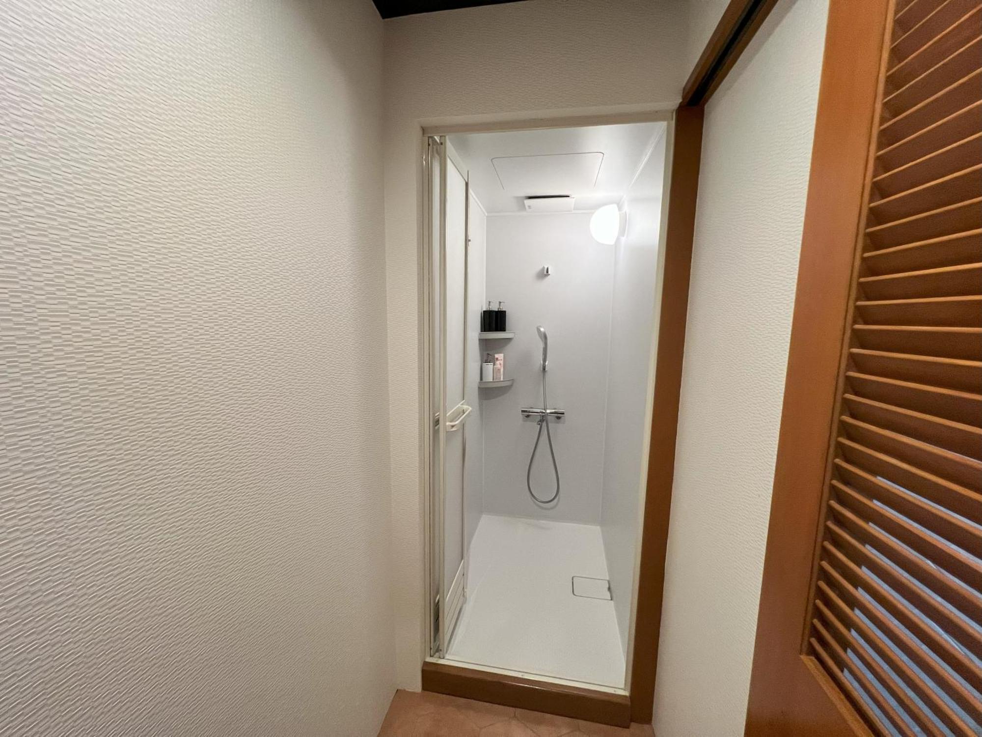 ゲストハウス Joooy Hotel 奄美 Amami Bagian luar foto